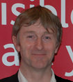 Photo of Martin Jarvis, Managing Director of DMJ Computer Services Photo of Martin Jarvis on red background